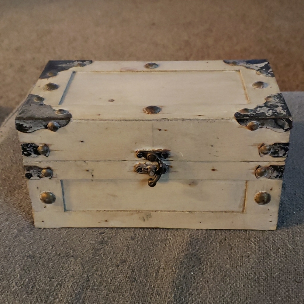 Wooden box with vintage metal hinges